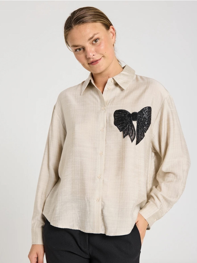 Freequent Sequins bow application Moonbeam w. black